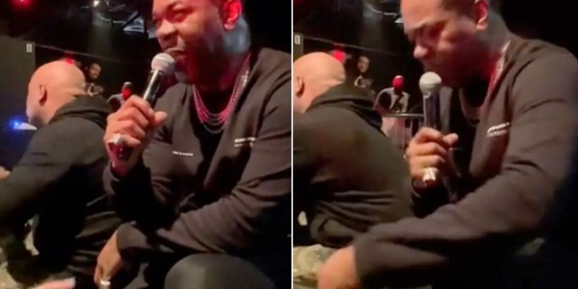 rapper Busta Rhymes woman hand personal space concert